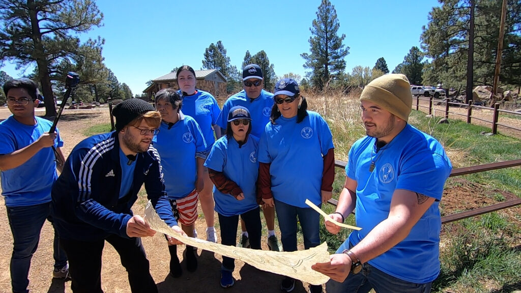 Missions & Madness team reviews a map at Buffalo Park